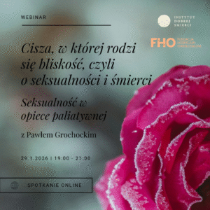 Zamarznięta róża i czarny napis